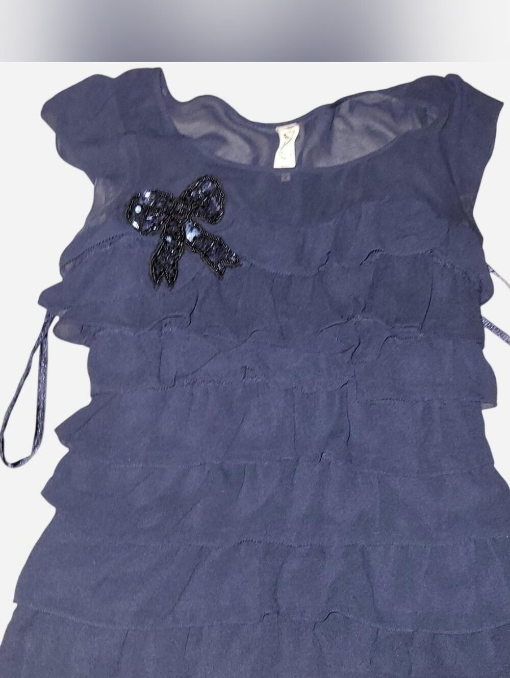 Floreat Navy Tiered Ruffle Top with Beaded Bow Accent